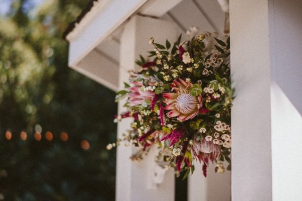Pink King Protea blooms were the crowning glory of this floral installation on the gazebo.