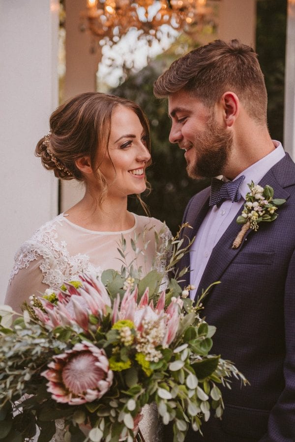 The pink King Protea blooms were also used in the bride's bouquet for a true show stopping look.