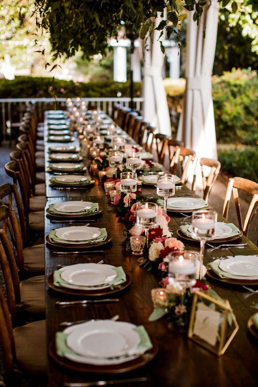 Long table for large wedding party with floral centerpieces / Romantic / Moody / Fall / Sage Green / Berry / Beige